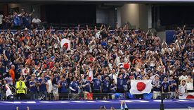 Los hinchas japoneses festejan uno de los goles en el empate 2-2 ante Países Bajos en el debut mundialista. Los hinchas japoneses festejan uno de los goles en el empate 2-2 ante Países Bajos en el debut mundialista.