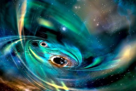 Representación de agujeros negros monstruosos en una nube de gas. Foto: Dpa. Representación de agujeros negros monstruosos en una nube de gas. Foto: Dpa.