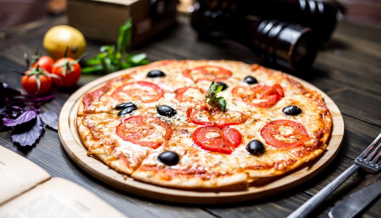 La pizza puede salvarte la vida. Foto: Foto de Comida creado por stockking - www.freepik.es