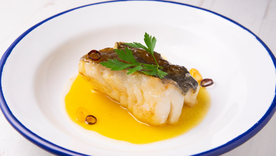 El nombre de la receta proviene del sonido que hace el aceite al emulsionarse suavemente. El nombre de la receta proviene del sonido que hace el aceite al emulsionarse suavemente.