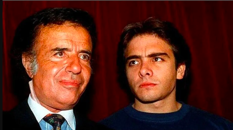 Carlos Saúl Menem junto a su hijo Carlitos.