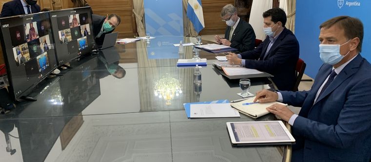 Suarez, De Pedro y Ziliotto, en la reunión de hoy en la Casa Rosada.