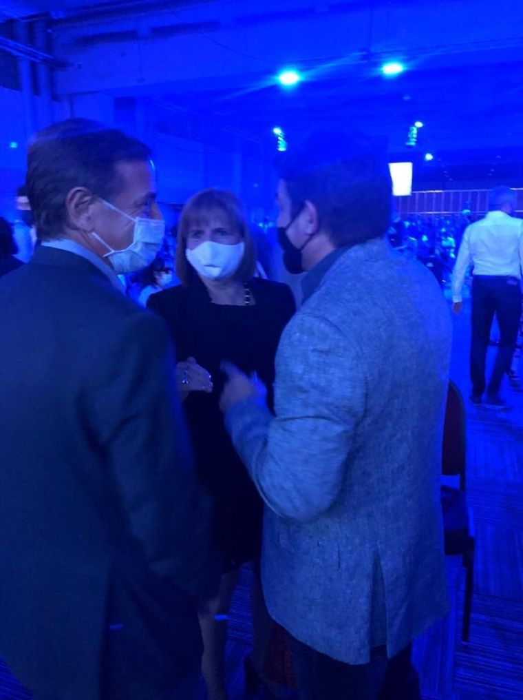 Suarez, De Marchi y Bullrich, en la presentación del libro de Macri. Foto: Twitter Omar de Marchi