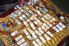 El dinero y los paquetes de cigarrillos fueron recuperados Foto: Ministerio de Seguridad de Mendoza