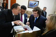 El momento en el que el pastor Ledesma con Javier Milei.