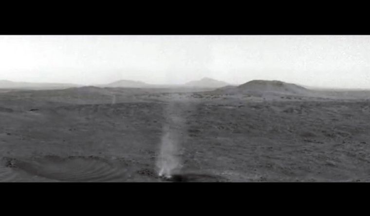 Diablo de polvo absorbiendo a otro en Marte. Foto: Dpa.