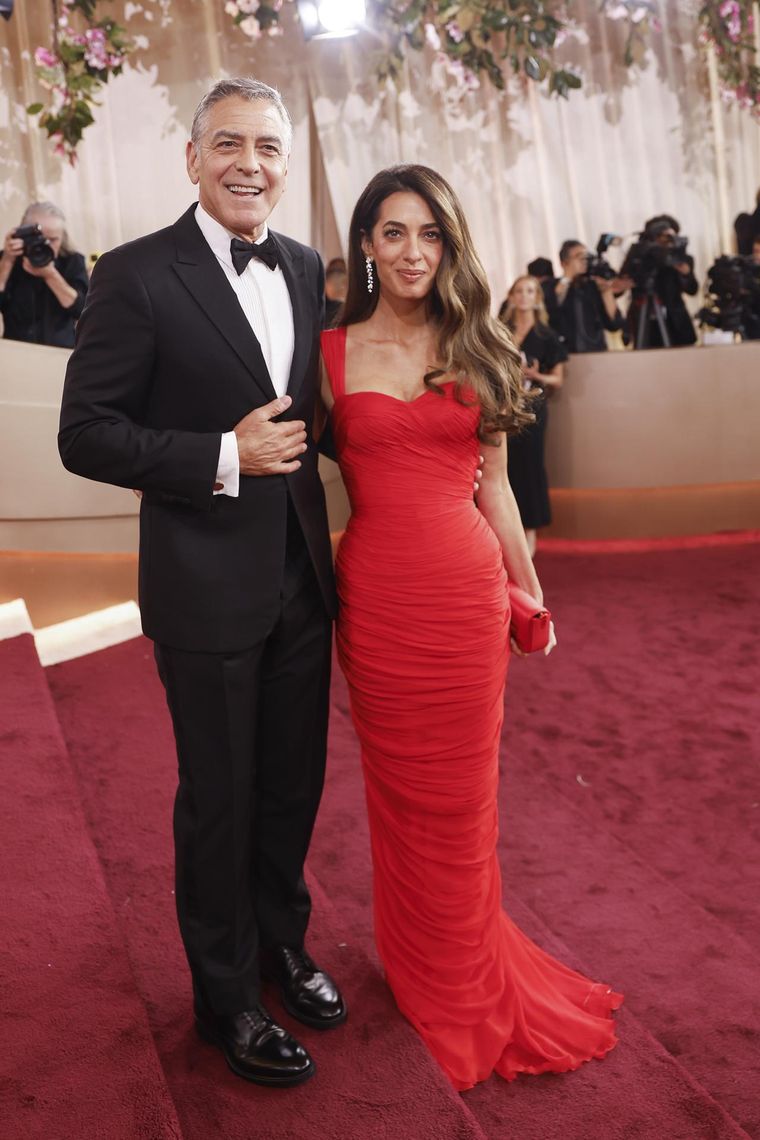 George Clooney y Amal Clooney. George Clooney y Amal Clooney.