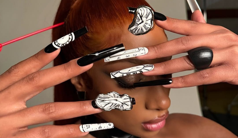 Uñas realizadas por @nailedbytav