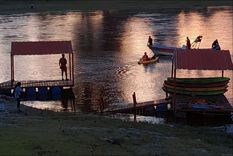 Buscan intensamente a un hombre que fue visto por testigos arrojándose al río en la desembocadura del lago San Roque cuando llegaba la creciente Foto: Carlos Paz Vivo