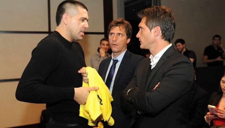 Román junto a Gustavo y Guillermo, en 2017. Foto: publicada en Clarín