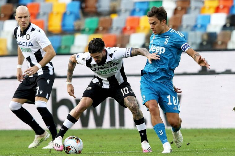 Rodrigo De Paul y Paulo Dybala. Foto: EFE