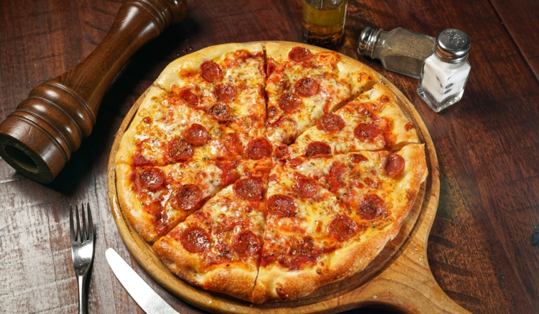 Cómo hacer pizza de pepperoni perfecta en casa Foto: Shutterstock