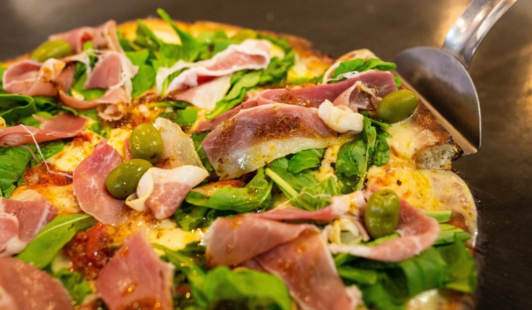 Sencillamente Irresistible: pizza de jamón y rúcula Foto: Shutterstock