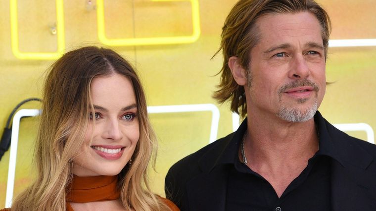 Así fue como Margot Robbie improvisó en Babylon para besar a Brad Pitt Margot Robbie y Brad Pitt Foto: Infobae