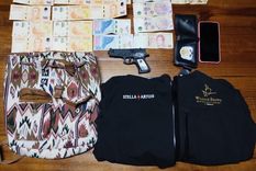 Arma incautada y botín recuperado del robo en el Parque Foto: Ministerio de Seguridad de Mendoza