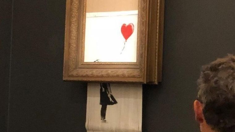 El cuadro de Banksy se autodestruyó durante una subasta. Foto: BBC Mundo