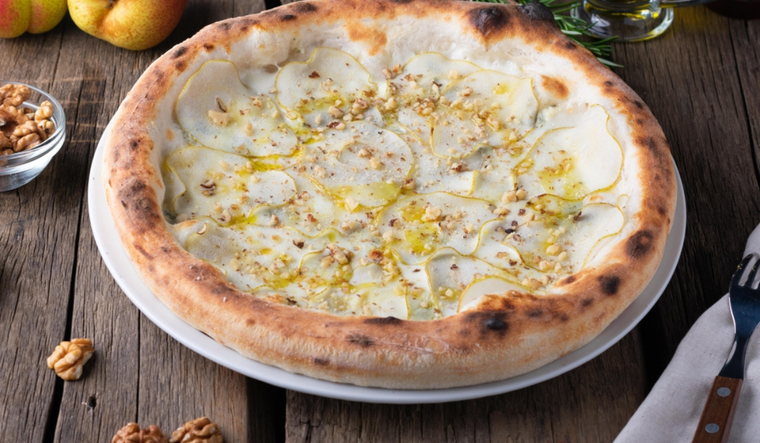 Explora nuevos sabores con la pizza dulce de peras Foto: Shutterstock