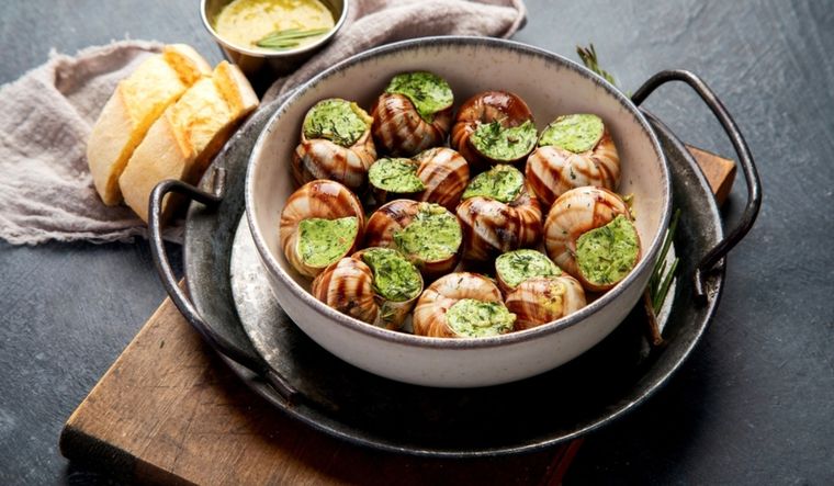 Elegancia en cada bocado: escargot francés en tu hogar Foto: Shutterstock