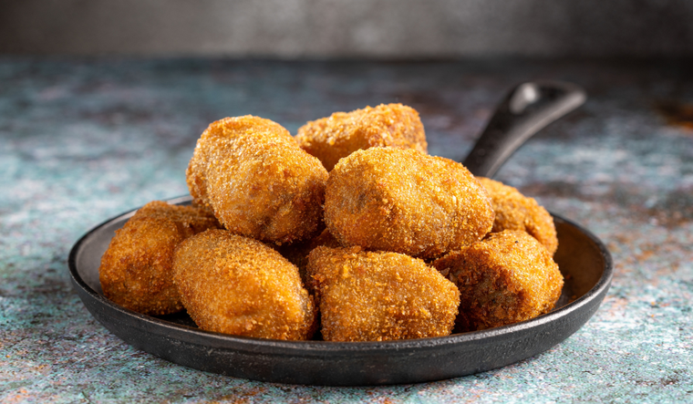 La receta de croquetas de jamón surgió como una forma de aprovechar sobras.