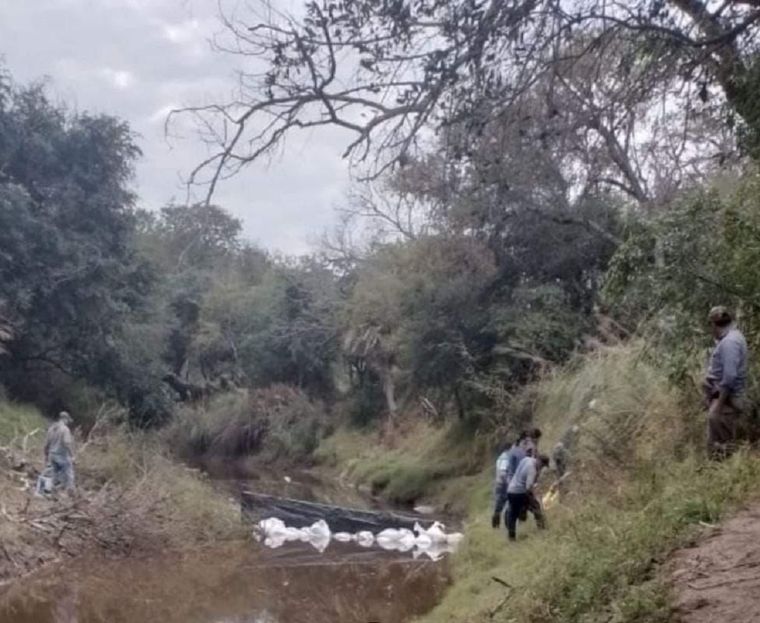 El trabajo de los forenses en el río