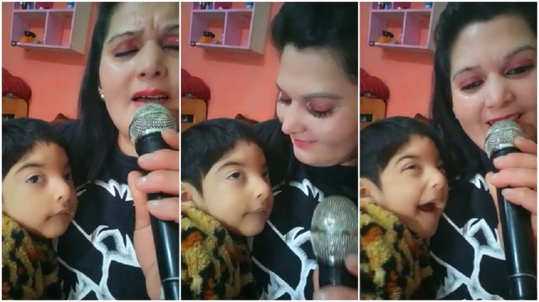 Gabriela, cantando junto a su hijo Agustín. Foto: Vía País