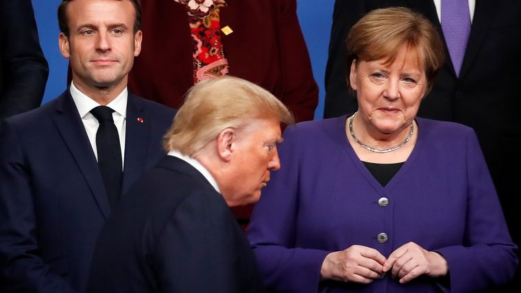 Emmanuel Macron, Donald Trump y Angela Merkel. Foto: RT