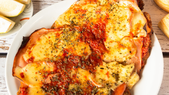 Sabor auténtico: milanesas a la napolitana al estilo argentino Foto: Shutterstock Sabor auténtico: milanesas a la napolitana al estilo argentino Foto: Shutterstock