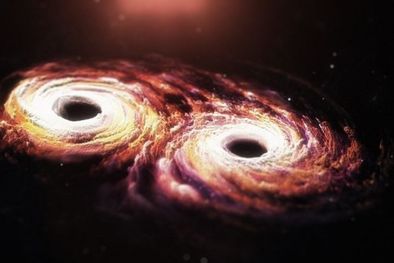 MDZol | Impresión artística de agujeros negros supermasivos en el corazón de cada galaxia que giran en espiral entre sí. Foto: EPTA/STELIOS THOUKIDIDES
