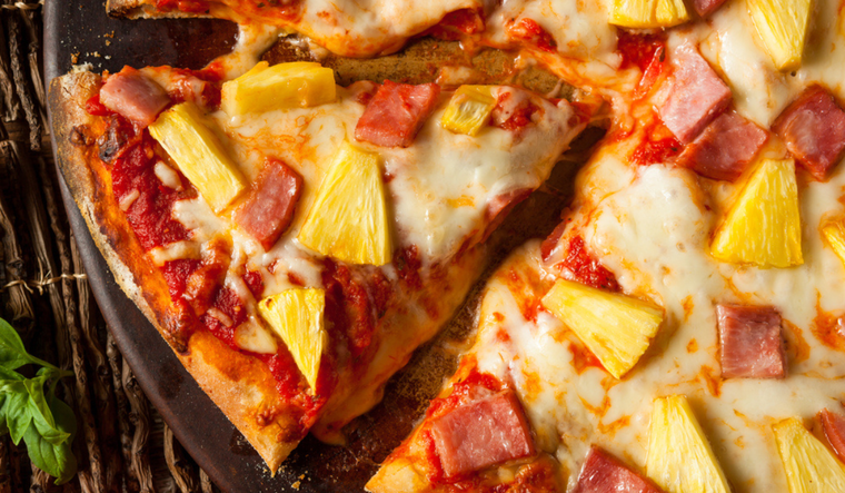 Pizza hawaiana de jamón y piña: un placer exótico para tu paladar Foto: Shutterstock