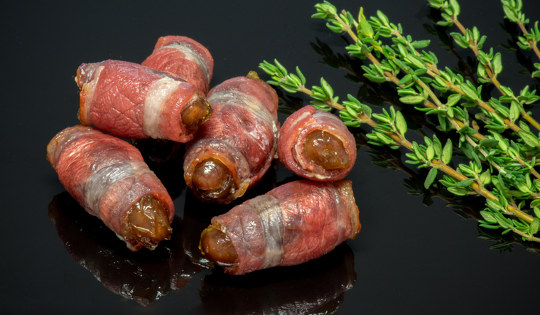 Receta fácil de dátiles envueltos en bacon: delicia para todas las ocasiones Foto: Shutterstock