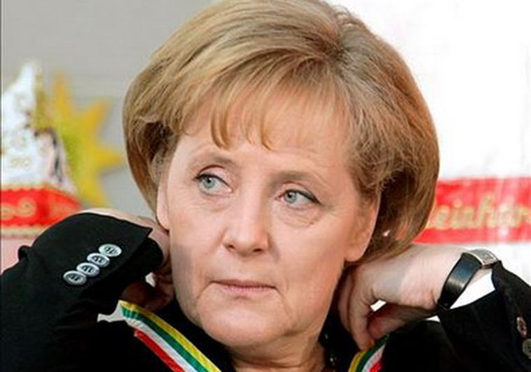 Por lo menos, Merkel festeja. Foto: EFE