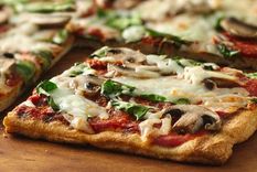 La pizza del 10: con hongos, rúcula y queso parmesano