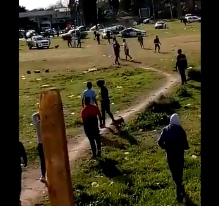 Una captura de uno de los videos que se viralizó del picadito que terminó en una batalla campal