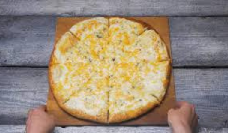 Pizza quattro formaggi : receta fácil y deliciosa Foto: Shutterstock