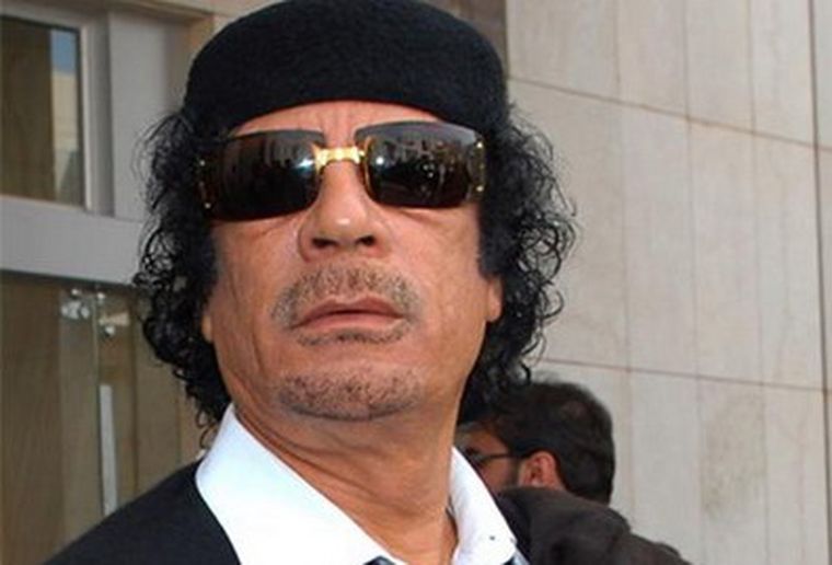Muammar Gadafi.