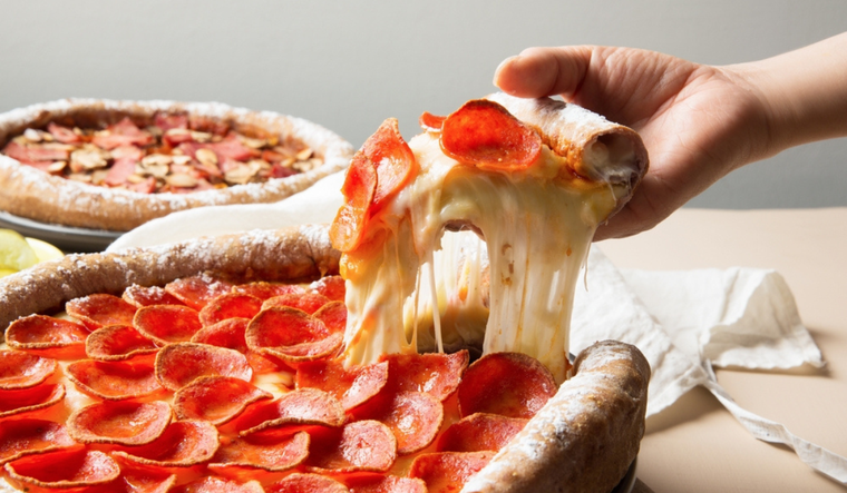 Fabulosa pizza e pepperoni lista para disfrutar bocado a bocado Foto: Shutterstock