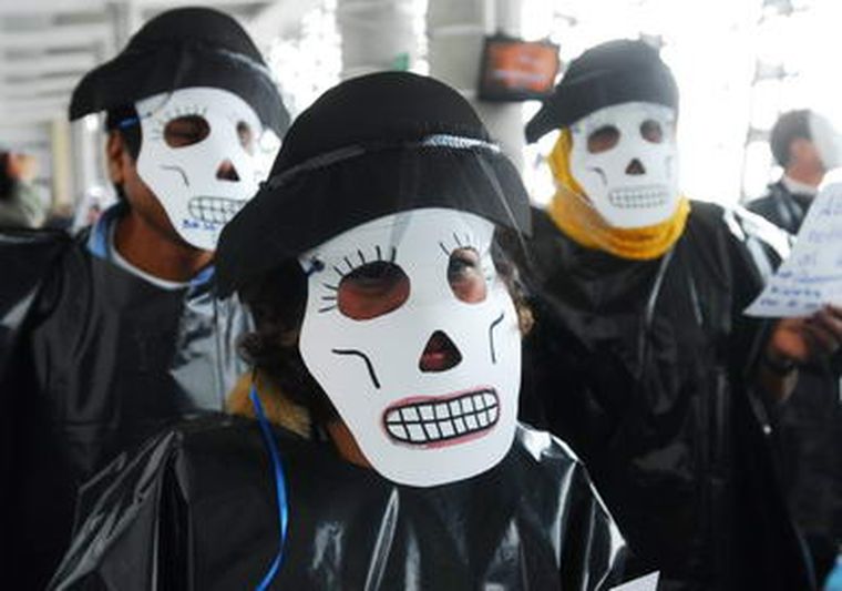 Activistas protestan la Conferencia Internacional sobre el Sida en México. Foto: EFE