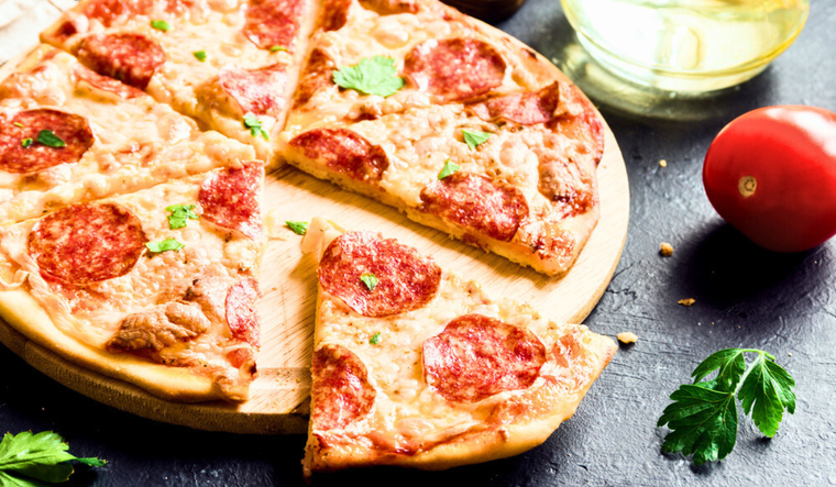 Hacer pizza de pepperoni en casa: receta y consejos para el éxito Foto: Shutterstock