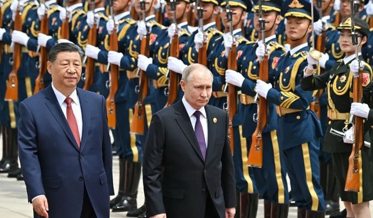 Los presidentes se reúnen en China para afianzar la sociedad. Foto: Efe.