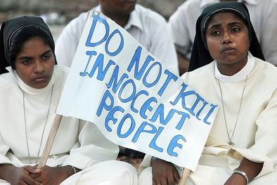 MDZol | Los cristianos son una minoría religiosa en la India. El cartel reza: no maten a gente inocente. Foto: GETTY IMAGES