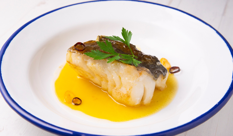 El nombre de la receta proviene del sonido que hace el aceite al emulsionarse suavemente.